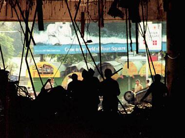  Indian officials inspect bomb damage in the basement of the Air India building, one of a series of bombs that rocked Mumbai in 1993. AFP