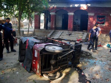 In this photograph taken on March 1, 2013, the wreckage of a three wheeler is seen in front of a Bangladeshi police station in Gaibandha north from Dhaka, where Jamaat-e-Islami activists killed three police personal.