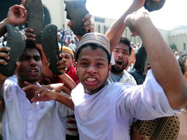 Violence erupted as activists of JI clashed with security forces, denouncing the judgement. PTI
