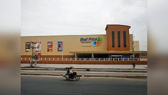 Pending bribery probe, Wal-Mart puts India expansion on ice