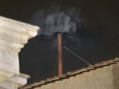Crowds gathered at St Peter's Square at the Vatican were disappointed to see this puff of black smoke. Reuters