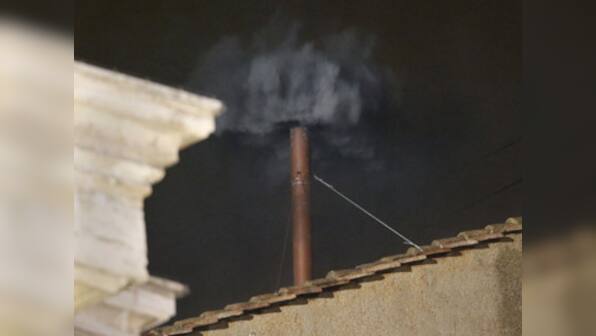 At Vatican, black smoke - Pope not elected on first day of conclave