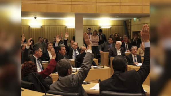 Cyprus seeks Russian rescue after parliament rejects EU bailout plan