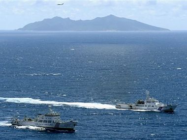 Is China trying to overwhelm Japanese ships on disputed waters? Is China trying to overwhelm Japanese ships on disputed waters?