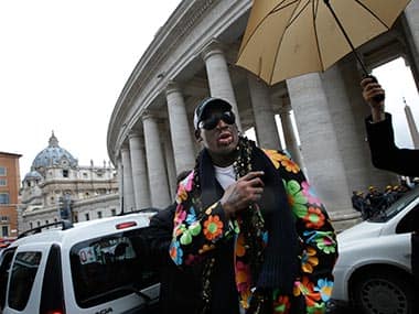 Former NBA star Dennis Rodman walks next to the Bernini Colonnade near St. Peter's Square at the Vatican. AP 