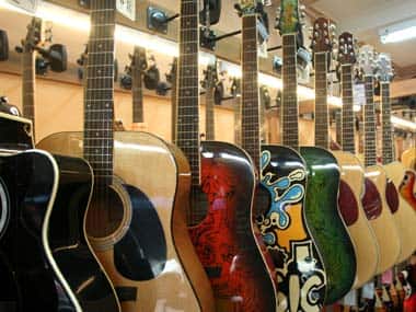 Guitars on display at a musical instrument shop in Bangkok. AP