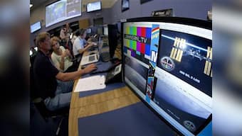 Soyuz capsule with three astronauts successfully docks with ISS