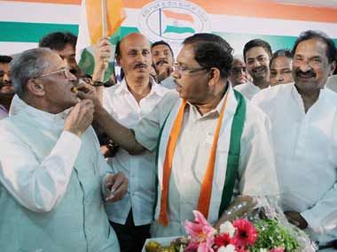 Members of the Karnataka Congress unit celebrate the party's showing in the state civic polls. PTI