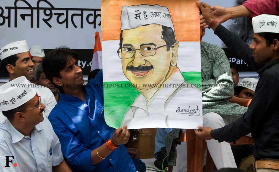 Supporters of Arvind Kejriwal hold up his poster in New Delhi on Saturday. Naresh Sharma/ Firstpost Supporters of Arvind Kejriwal hold up his poster in New Delhi on Saturday. Naresh Sharma/ Firstpost