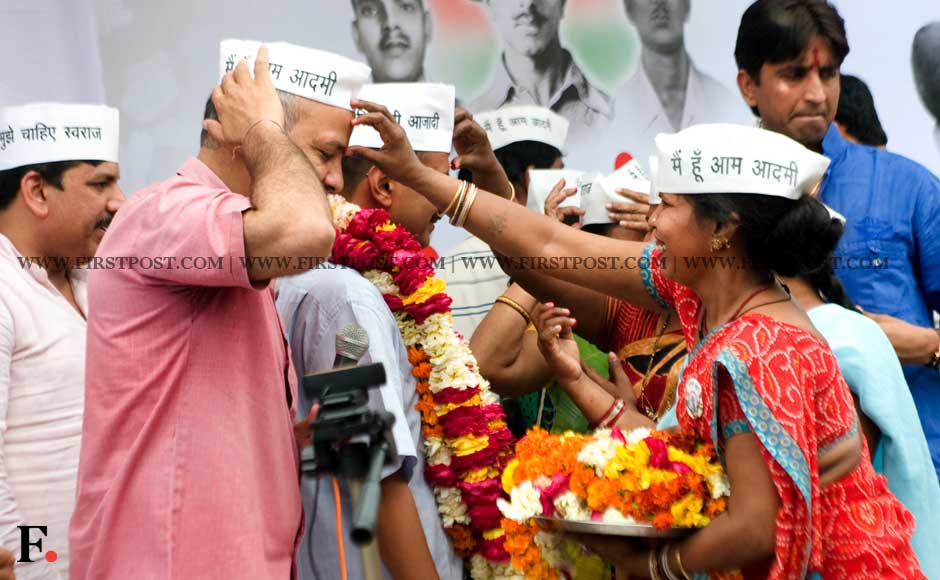 Arvind Kejriwal's supporters garland him as he begins his fast. Naresh Sharma/ Firstpost Arvind Kejriwal's supporters garland him as he begins his fast. Naresh Sharma/ Firstpost