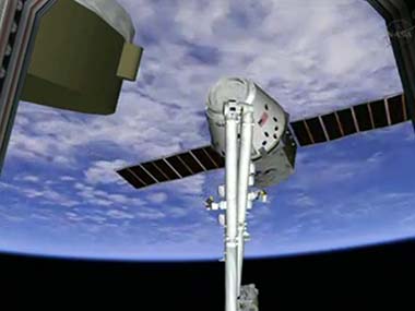 SpaceX's Dragon supply ship finally docks with International space station SpaceX's Dragon supply ship finally docks with International space station