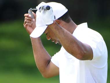 Woods's bid for world number one thwarted by storm Woods's bid for world number one thwarted by storm