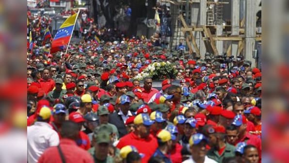 Mourners hail Hugo Chavez as spiritual father of Venezuela 