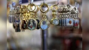 Pope Francis trinkets sell briskly near Vatican