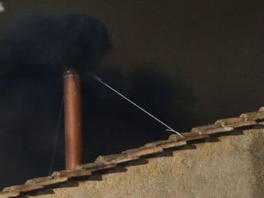 Black smoke billows from Sistine Chapel chimney in Vatican. Reuters