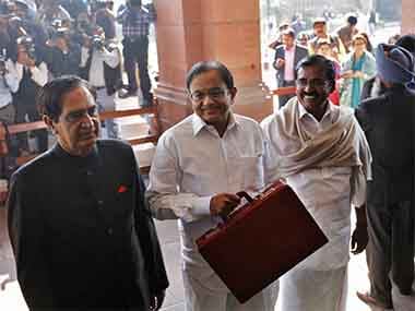 India's Finance Minister Palaniappan Chidambaram (C) arrives at the parliament to present the 2013/14 federal budget in New Delhi February 28, 2013. Reuters