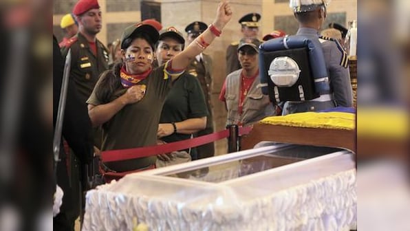 Hugo Chavez's body to be embalmed and put on permanent display