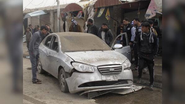 Two car bombs kill at least 22 in Iraqi capital