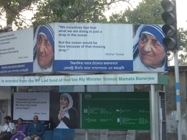 Billboards in homage to Mother Teresa at a Kolkata bus stop. Sandip Roy/Firstpost
