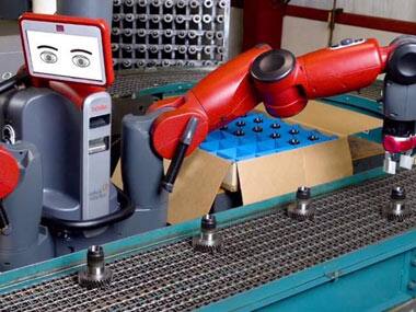 Rethink's user-friendly $22,000 Baxter robot helps US manufacturers compete in a global economy. AP