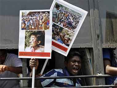 Students shout slogans from inside a bus during a protest in the southern Indian city of Chennai March 18, 2013. Reuters