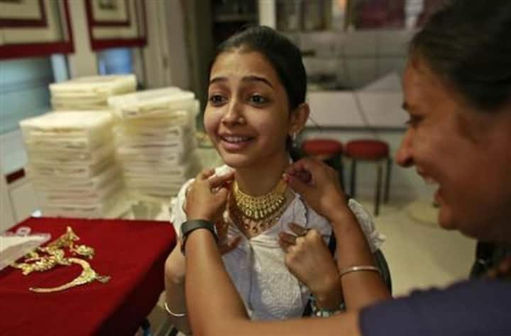 India's gold pawn business stumbles as metal skids
