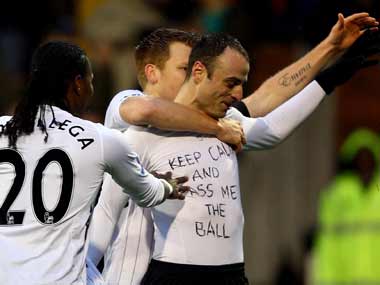 Berbatov reveals his famous ‘Keep calm and pass me the ball’ tshirt. Getty Images