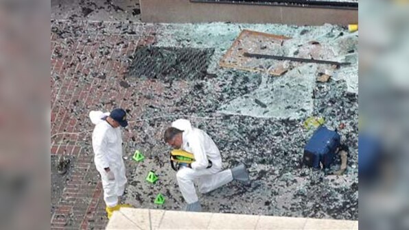 Boston blasts suspect spotted on video, no arrests yet