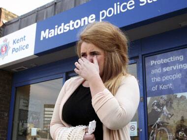 Youth Police and Crime Commissioner Paris Brown breaks down during media interviews outside Maidstone Police Station, England. AP