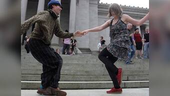 Dozens of Washington residents shake a leg to protest dance tax