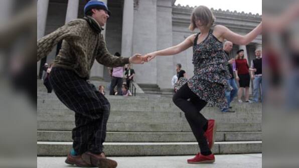 Dozens of Washington residents shake a leg to protest dance tax