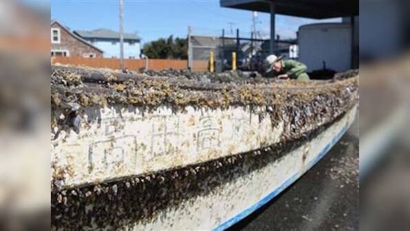 Boat caught in Japan tsunami washes ashore in California