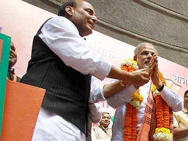 BJP President Rajnath Singh and Gujarat CM Narendra Modi. PTI