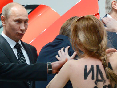Putin 'liked' topless Femen protest against him in Germany Putin 'liked' topless Femen protest against him in Germany