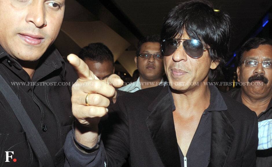 Shah Rukh Khan returned from Vancouver after attending the TOIFA ceremony and was spotted leaving Chhatrapati Shivaji International Airport on the wee hours of Wednesday. Sachin Gokhale/Firstpost 