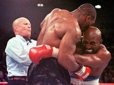 Mike Tyson decided he had to have a taste of Evander Holyfield. Getty