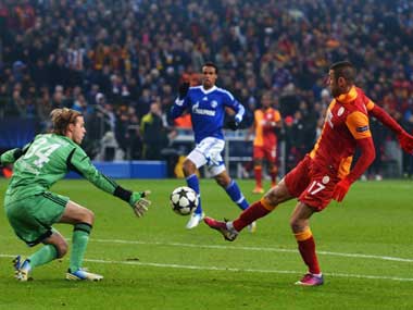 Burak Yilmaz scores in the Champions League. Getty Images