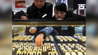 RBI probes banks for sale of gold investment products