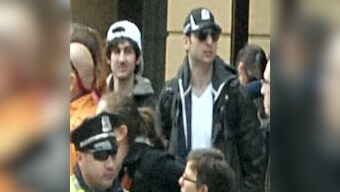 One Boston blasts suspect dead; police ask residents to 'stay home'