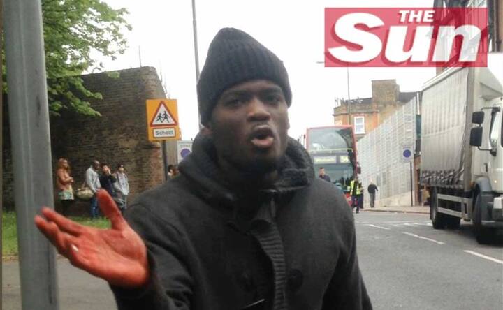 Images: Killers go on video after brutally hacking soldier to death in London 