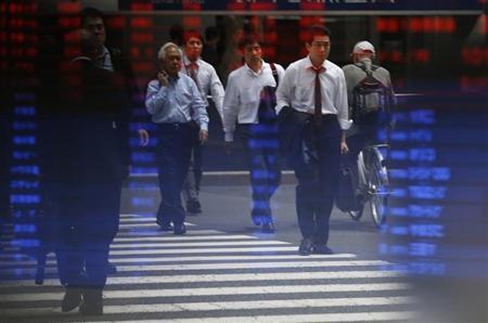 Dollar near 10-month peak on Fed remarks; Asian shares mixed Dollar near 10-month peak on Fed remarks; Asian shares mixed