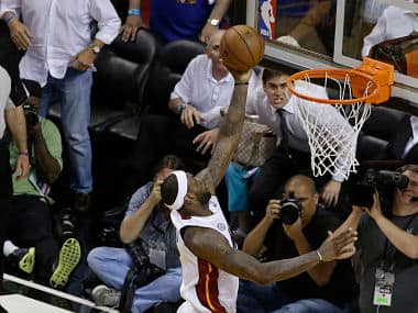 LeBron James scores the game-winning basket. AP