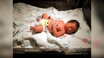 Woman who reported newborn in sewer pipe in China is the mother