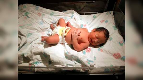 Woman who reported newborn in sewer pipe in China is the mother