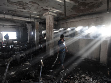 Bangladesh building collapse: Rainstorms halt recovery efforts Bangladesh building collapse: Rainstorms halt recovery efforts