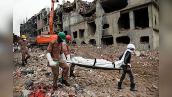 Bangladesh officials say building collapse death toll hits 1,034