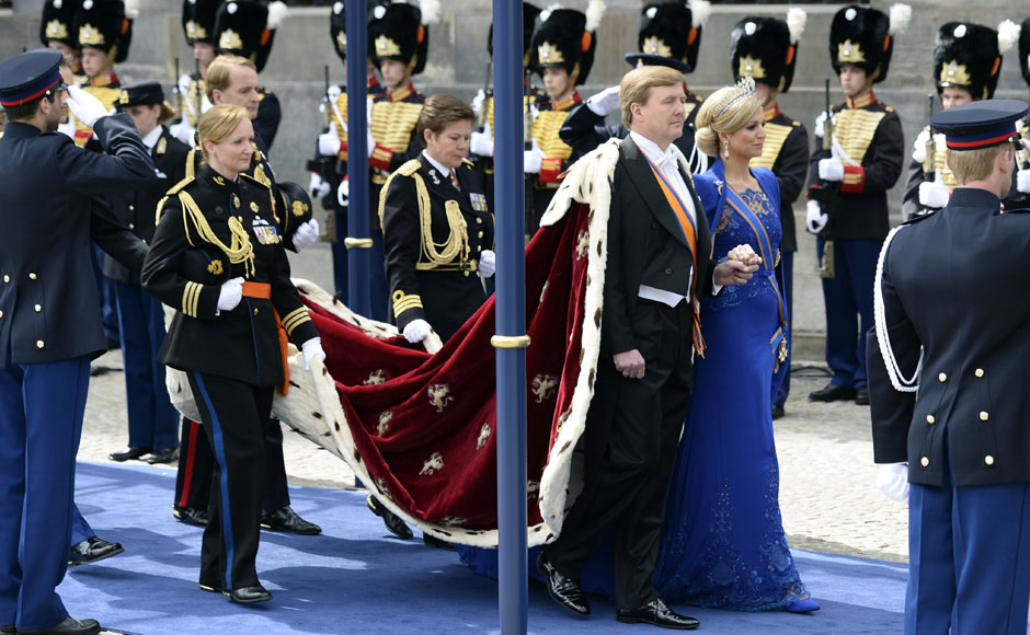Dutch King Willem-Alexander and his wife Queen Maxima arrive at Nieuwe Kerk church before the religious crowning ceremony in Amsterdam on Tuesday. Reuters Dutch King Willem-Alexander and his wife Queen Maxima arrive at Nieuwe Kerk church before the religious crowning ceremony in Amsterdam on Tuesday. Reuters
