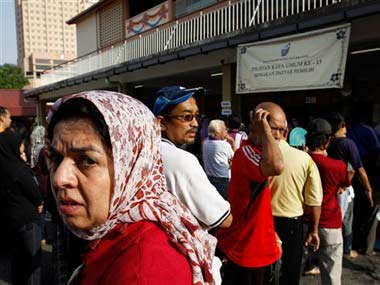 Voting begins in Malaysia: Will ruling party lose after 56 year reign? Voting begins in Malaysia: Will ruling party lose after 56 year reign?