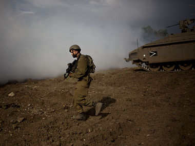 Exchange of fire on Gaza border kills Palestinian gunman, wounds three Israeli soldiers; Hamas military post also targeted during incident Exchange of fire on Gaza border kills Palestinian gunman, wounds three Israeli soldiers; Hamas military post also targeted during incident