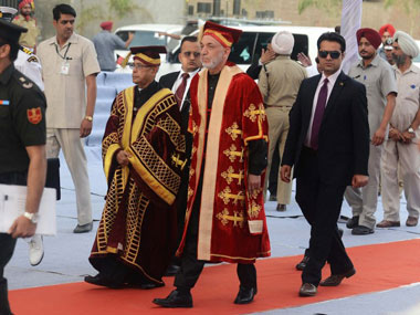 Pranab Mukherjee confers honorary doctorate on Hamid Karzai Pranab Mukherjee confers honorary doctorate on Hamid Karzai